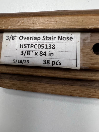 Mohawk Overlap Stair Nose_Solid Wood HSTPC-5138 Walnut Natural Hands